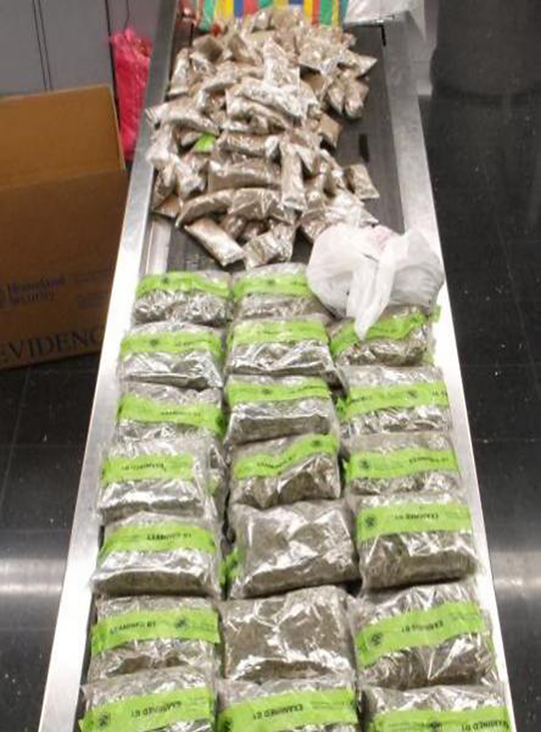 Opium concealed in travel luggage seized at airport